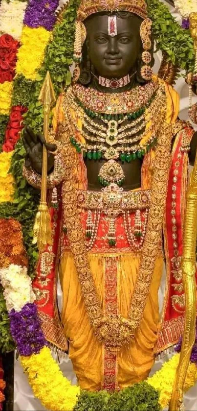 Vibrant Hindu deity adorned with colorful garlands and gold attire.