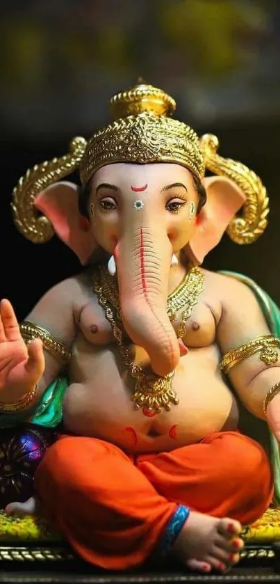 Mobile phone wallpaper featuring vibrant Ganesh deity statue.