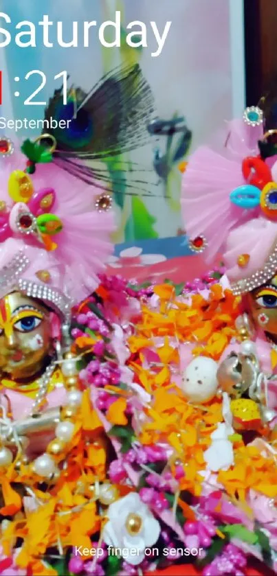 Colorful Hindu deities with flowers, vibrant phone wallpaper.