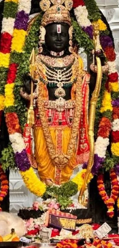 Vibrant Hindu deity adorned with colorful garlands in traditional attire.