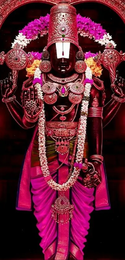 Hindu deity sculpture with jewelry and vibrant colors.