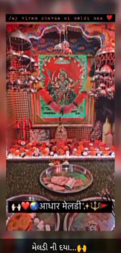 Colorful Hindu shrine with vibrant red accents.