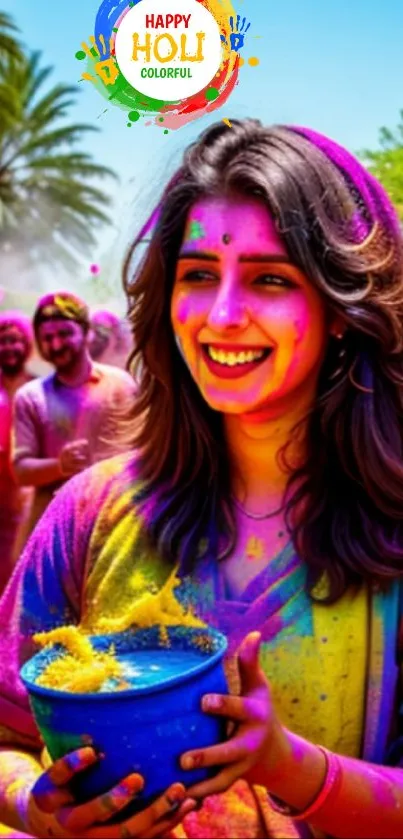 Colorful Holi celebration with smiling woman holding a blue bowl.