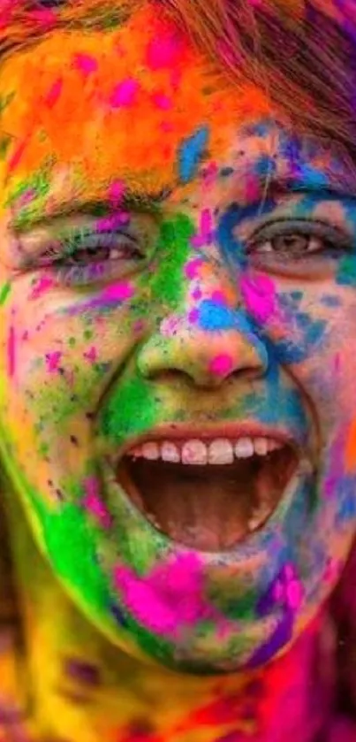 Joyful face covered in vibrant Holi colors, expressing festive cheer.