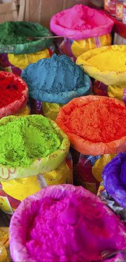 Colorful Holi powders forming a vibrant and lively wallpaper.