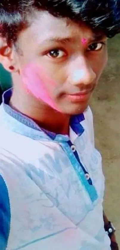 Vibrant Holi selfie showing colorful festival spirit.