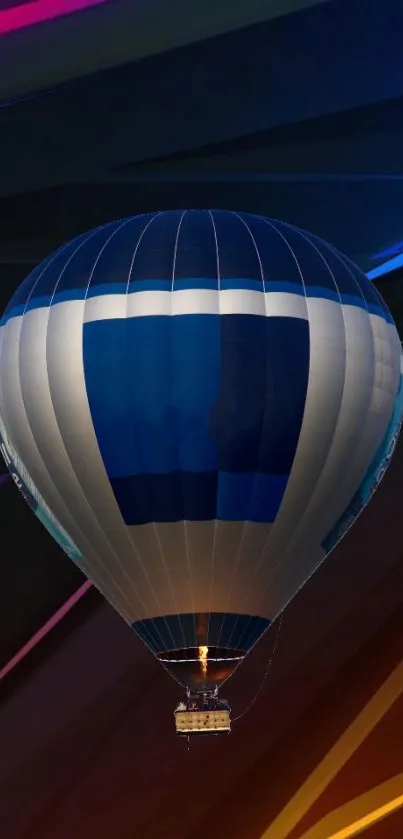 Colorful hot air balloon against abstract background.