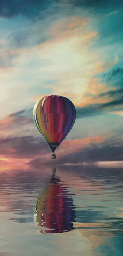 Colorful hot air balloon over reflective water under vibrant sky.