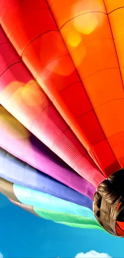 Vibrant hot air balloon against blue sky.