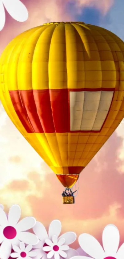 Hot air balloon in a colorful sky with white flowers framing the bottom.