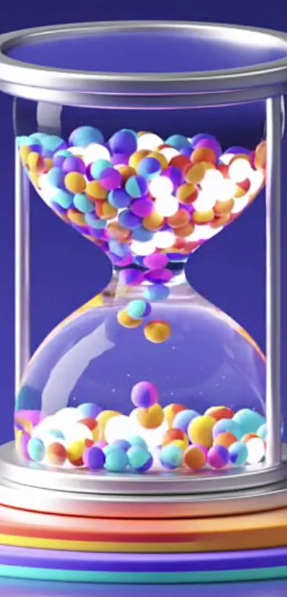 Hourglass with colorful spheres on blue background.