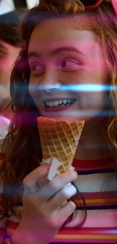 Girl smiling with ice cream cone and colorful neon lights.