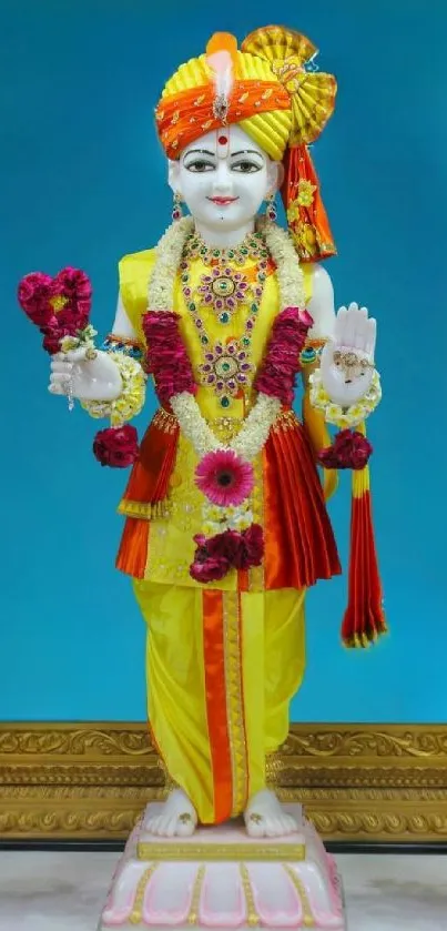 Vibrant Indian deity with colorful attire and ornate decorations.