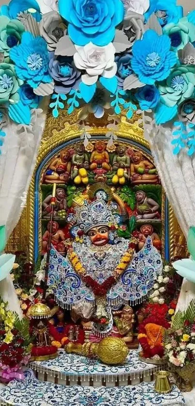 Intricate deity with colorful floral decorations.