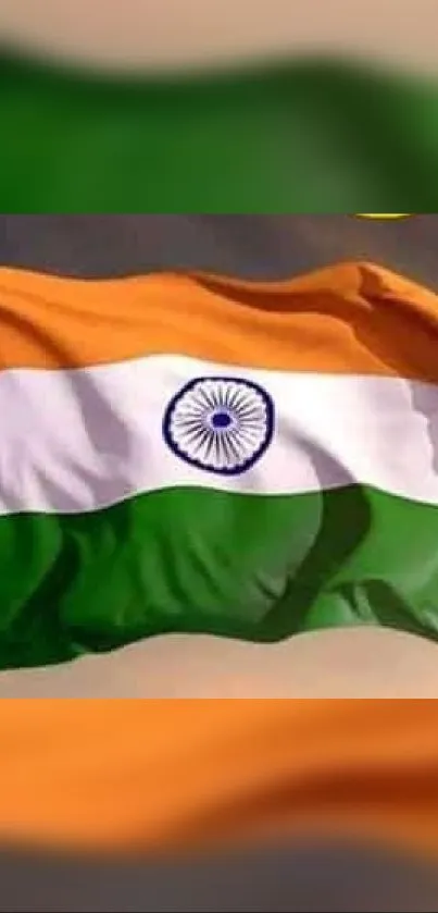 Indian flag with saffron, white, and green colors waving in the wind.