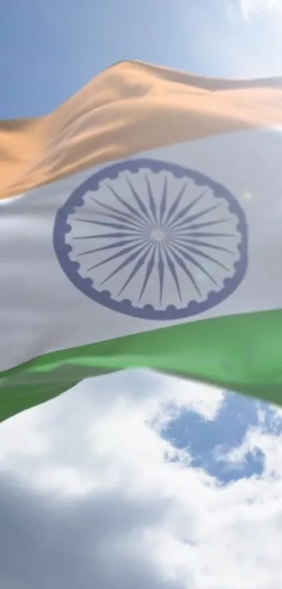 Indian national flag waving against a blue sky.