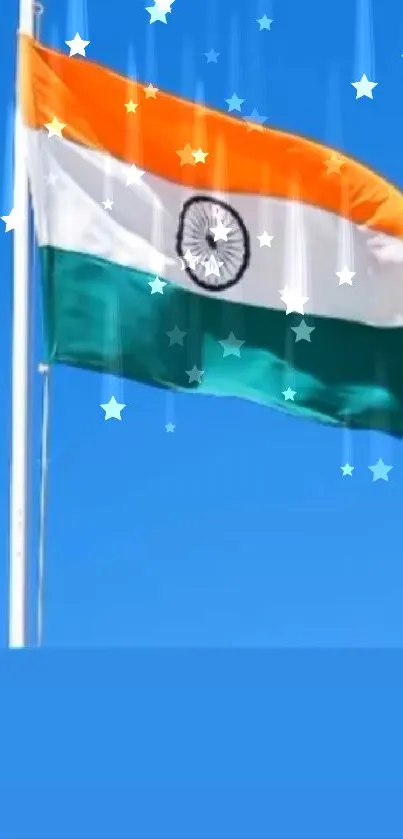 Indian flag waving against a clear blue sky.