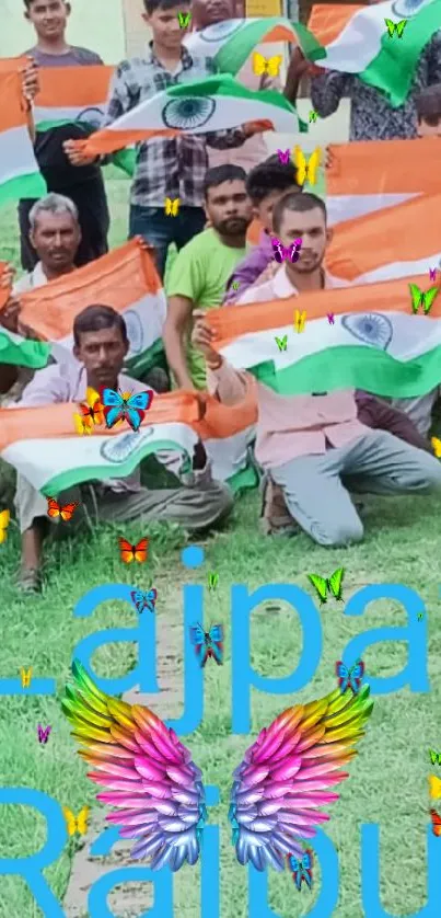 Group kneeling with Indian flags and colorful butterflies flying.