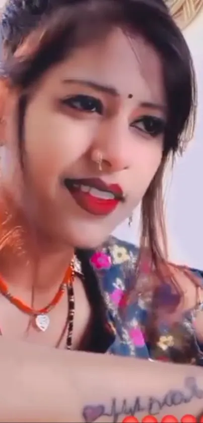 Vibrant Indian woman portrait with colorful jewelry and traditional attire.