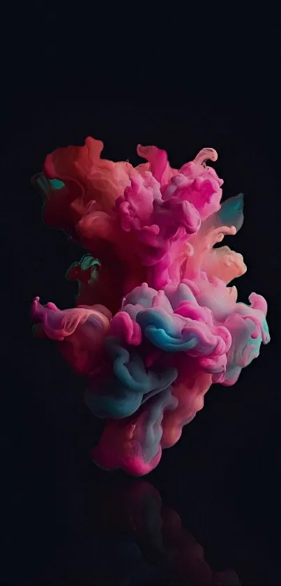 Vibrant pink and blue ink swirling against a dark background.