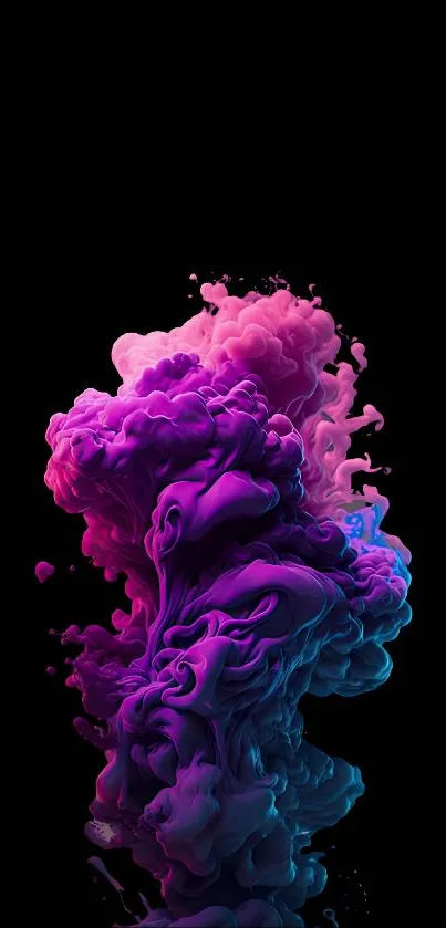 Vibrant ink splash in pink, purple, and blue on a black background.