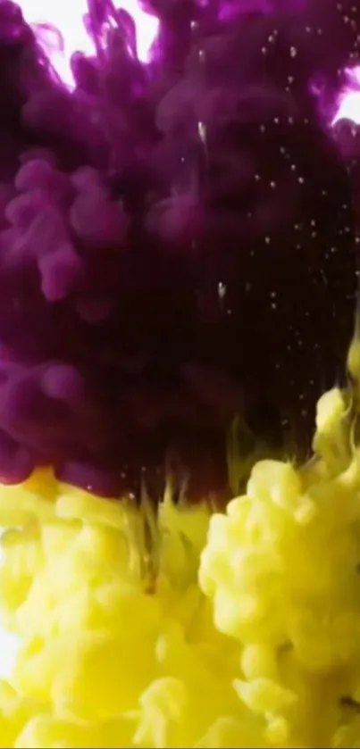 Purple and yellow ink swirling creatively in water.