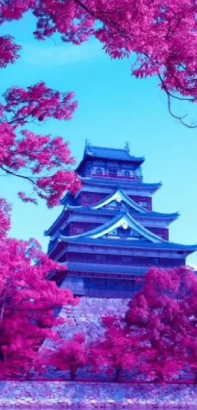 Japanese castle surrounded by pink cherry blossoms.