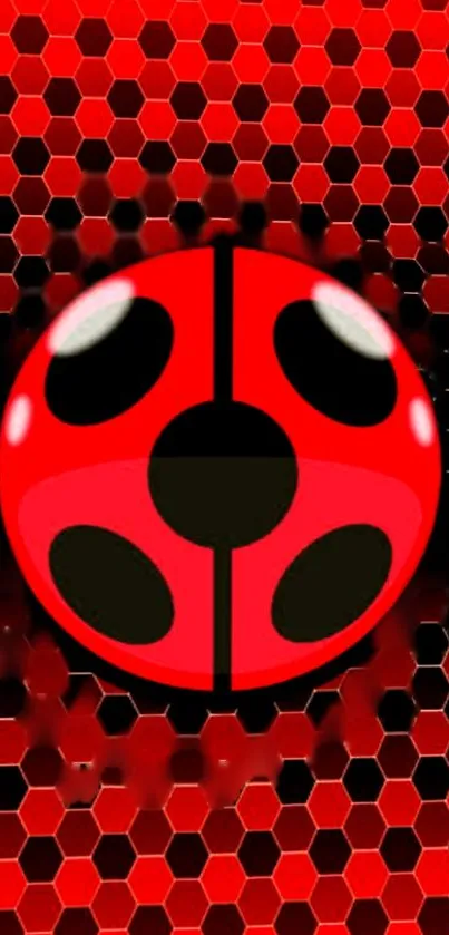 Vibrant red ladybug wallpaper with hexagonal background.