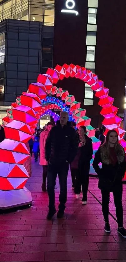 Vibrant urban LED arches glowing at night.