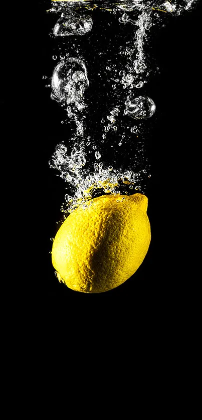 Lemon submerged in water with bubbles on a black background.