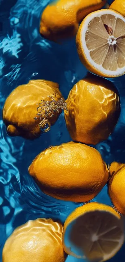 Yellow lemons floating on blue water, creating a vibrant and fresh appearance.