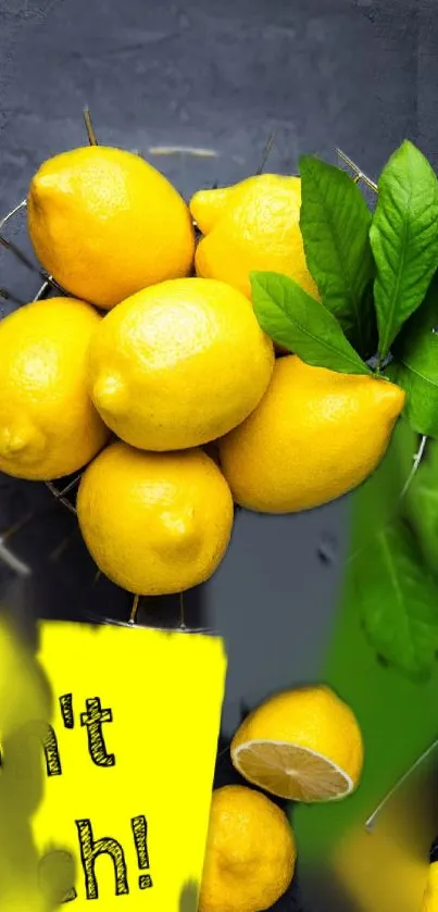 Bright yellow lemons with leaves on a dark background.