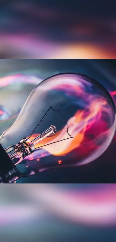 Vibrant light bulb with colorful abstract backdrop.