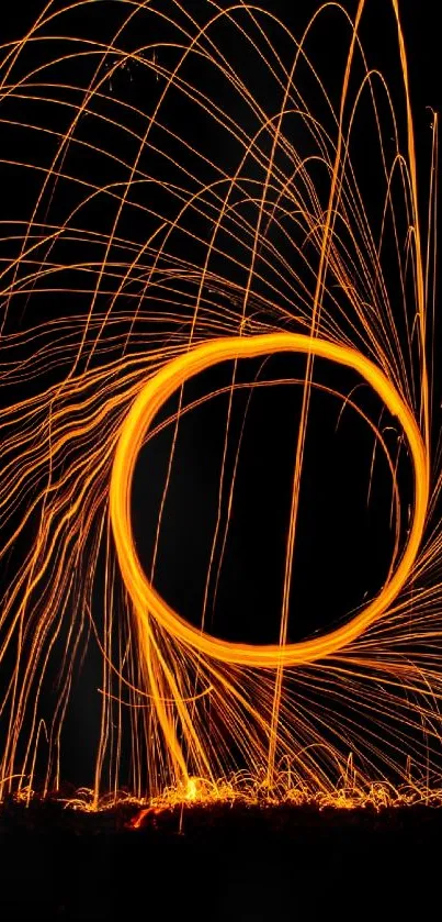 Vibrant orange light trails on a dark background wallpaper.