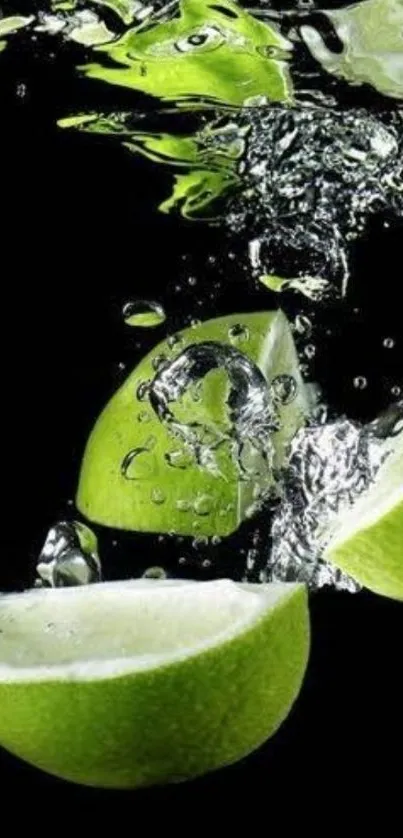 Lime slices splashing into water on a black background.