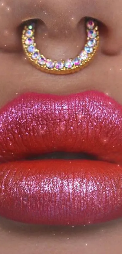 Close-up of lips with vibrant pink-red shades and sparkling jewelry.