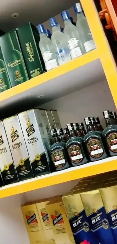 Colorful liquor shelf display with various brands and bottles.