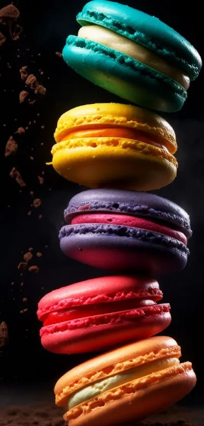 Stack of colorful macarons on a dark background.