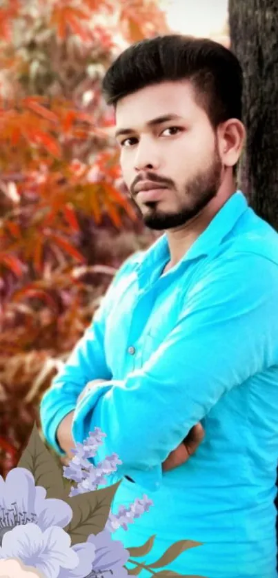 Man in blue shirt with colorful nature background