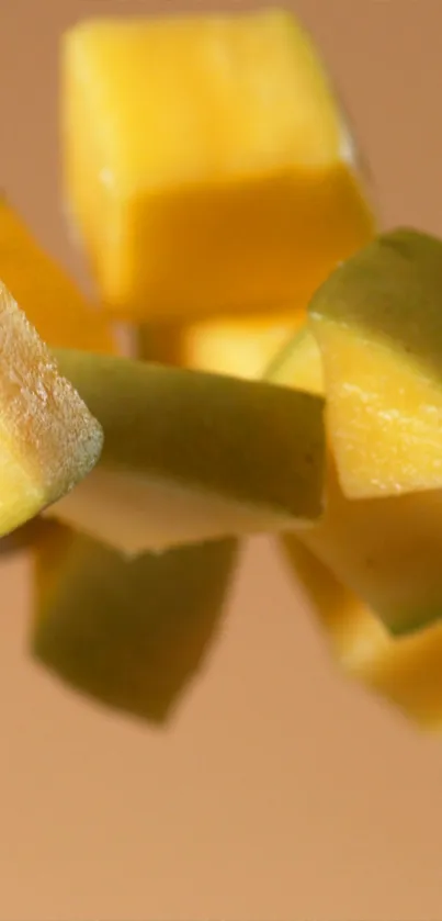 Close-up of vibrant mango cubes in an abstract artistic style.