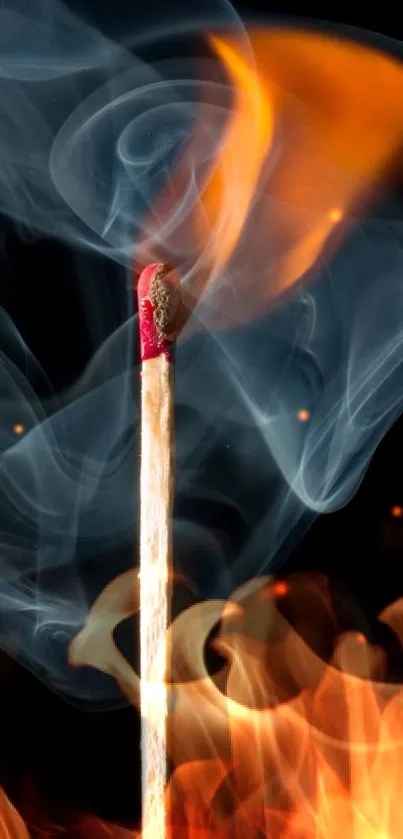 Matchstick engulfed in vibrant flame and smoke.