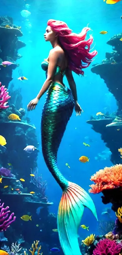 Mermaid swimming in vibrant coral reef surrounded by fish.