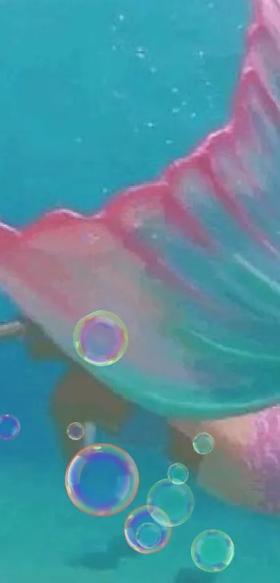 Colorful mermaid tail underwater with vibrant shades.