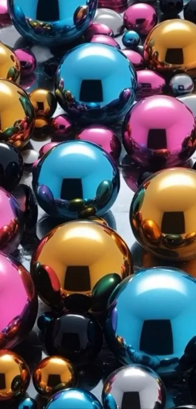 Colorful metallic spheres in blue, pink, and gold.