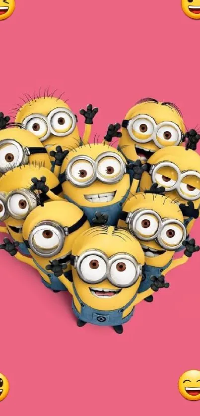 Minions forming a heart shape on a pink background with smiling faces.