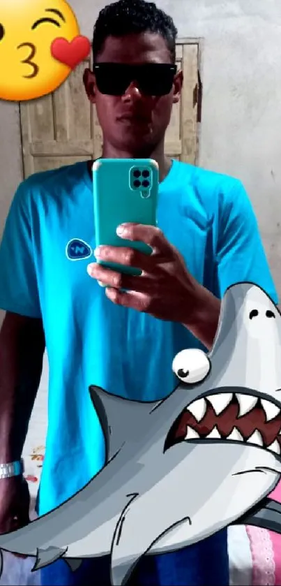 Mirror selfie with cartoon shark and emoji in cyan blue theme.