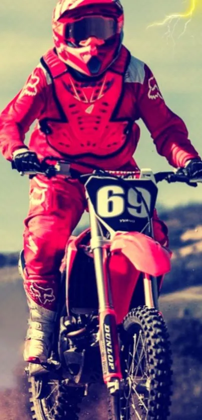 Motocross rider in vibrant red gear leaping on a dirt bike.