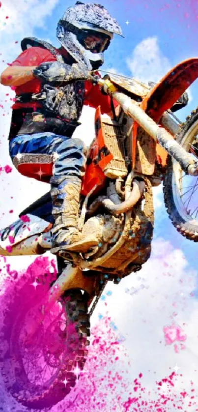 Motocross rider jumps with colorful splash background.