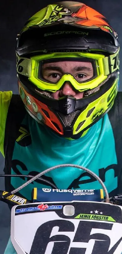 Vibrant motocross rider with neon gear on a smoky background.