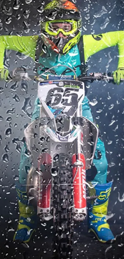 Motocross rider in neon gear with smoke backdrop.